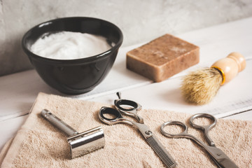 Mens hairdressing wooden desktop with tools for shaving