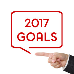 Businessman hand pointing 2017 goals sign on white background
