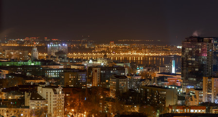 Fototapeta na wymiar Voronezh city night scene, beautiful modern buildings, bright glowing lights