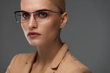 Women Eyewear. Beautiful Business Woman In Black Fashion Glasses