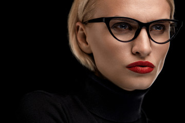 Fototapeta na wymiar Fashion Makeup Model With Red Lips And Black Eyeglasses Frame