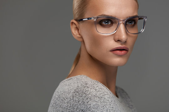 Female Eyewear. Woman In Beautiful Glasses Frame, Eyeglasses