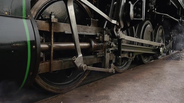Historical steam engine train locomotive. old technology background. nostalgic retro vintage style.