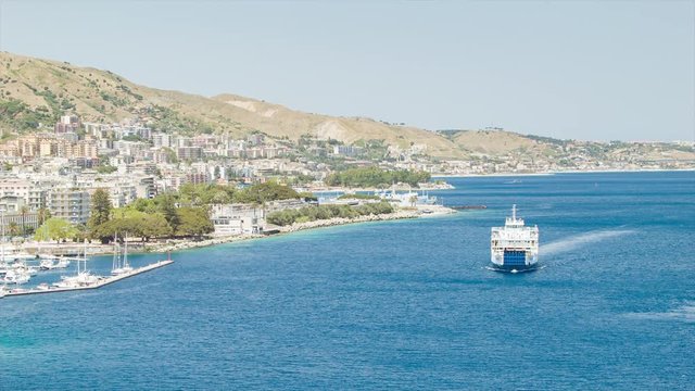 Ferry Off the Coast of Sicily Italy in the Strait of Messina Approaching the Port