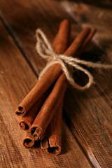Cinnamon sticks on a wooden table