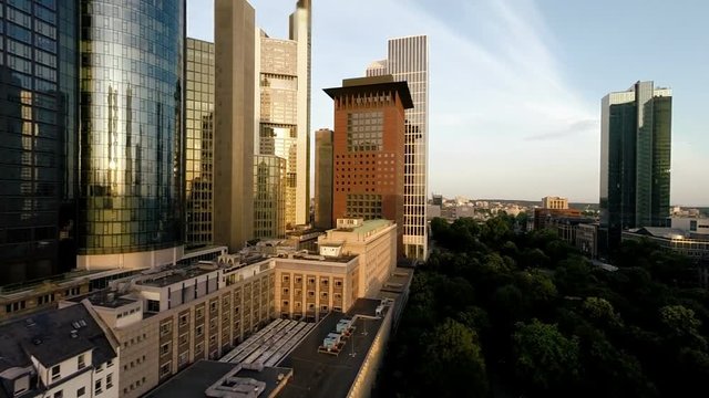 aerial view of city skyline at sunset.
