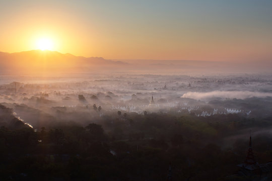 Beautiful scenery during sunrise,sunset of top view at Mandalay hill in Myanmar. is a beautiful location and very popular for tourists and photographer.