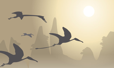 Silhouette of pterodactyl beautiful landscape © kongvector