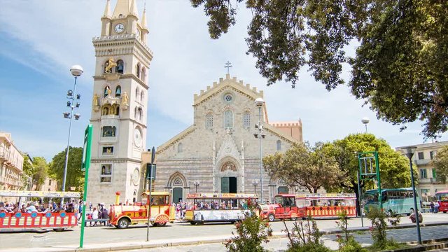 Duomo Cathedral and Tower in Messina Sicily Italy with Tourist Sightseeing Train Vehicles at the Piazza
