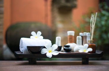 Fototapeta na wymiar Spa massage compress balls, herbal ball on the wooden with treaments spa , Thailand, select focus