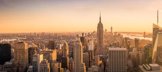 Deurstickers Manhattan New York City skyline panorama bij zonsondergang