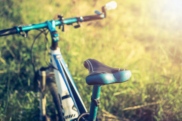 Fototapeta na wymiar Extreme mountain bike seat soft focus with vintage film filter.