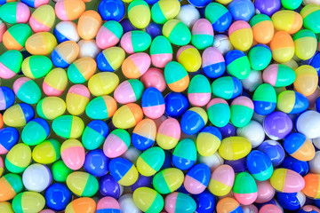 Colorful of lucky balls or eggs floated in water for gamble.