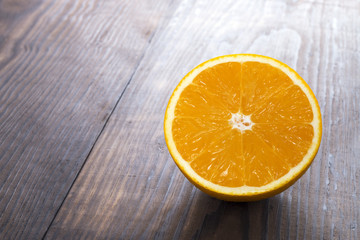 fresh orange fruit on wooden table