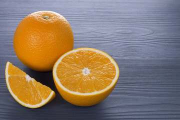fresh orange fruit on wooden table