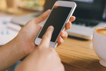 Woman use of smart phone at cafe
