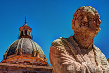 Beautiful sculpture of the famous fountain of shame on baroque Piazza Pretoria, Palermo, Sicily,...