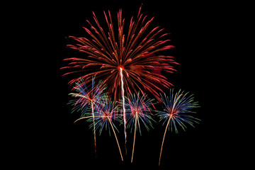 Fototapeta premium Colorful new year fireworks over dark sky