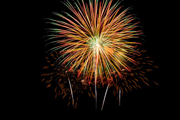 Obraz premium Colorful new year fireworks over dark sky