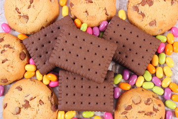 Heap of colorful candies and cookies, too many sweets