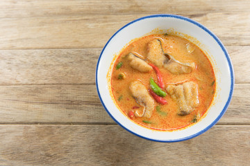 Spicy fish soup traditional food cuisine in Thailand on wooden t