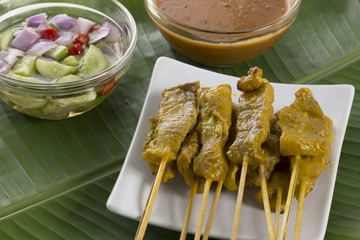 pork satay with peanut sauce or sweet and sour sauce, thai food
