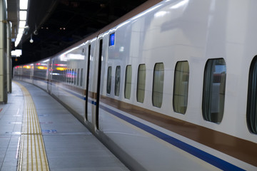 Bullet train station at dusk
