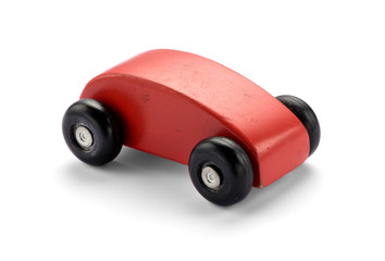 Simple stylized red wooden toy car