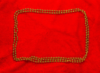 Christmas golden frame on red background