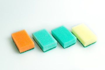Sponges for washing close-up on the table. Fight with dirt. Cannon Housewives.