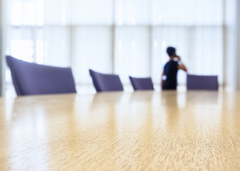 Blurred People in Boardroom Table Meeting Room Business concept