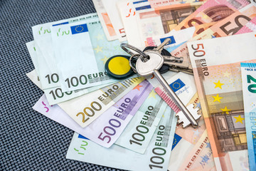 house key on euro bills as  background