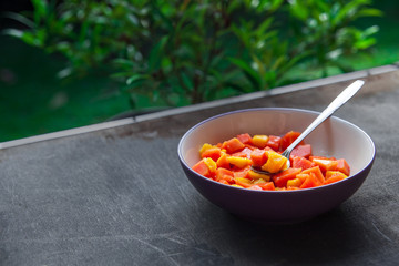 Healthy vegan breakfast of raw tropical fruits.