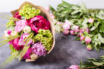 Bouquet of pink peonies. Still life with colorful flowers. Fresh peonies.  Place for text. Flower concept. Fresh spring bouquet. Summer Background