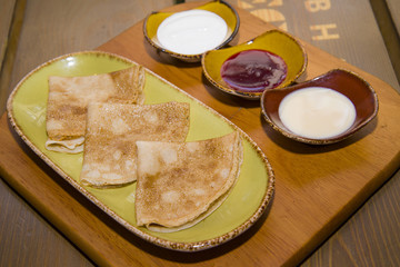 Traditional Russian dessert - fried pancakes.
