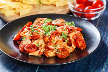 Pappardelle pasta with shrimp, tomatoes and herbs