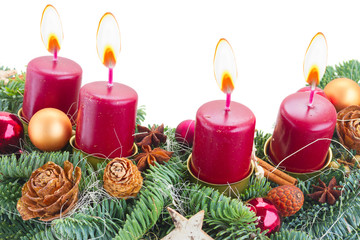 Evergreen fir tree advent garland with four burning candles isolated on white background
