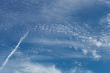 White clouds on a blue sky. Selective focus