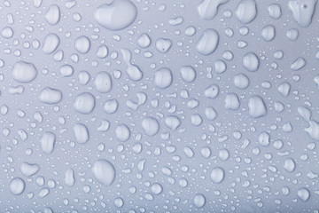 Drops of water on a color background