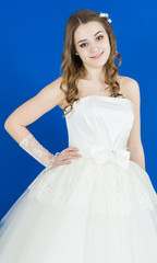 Fototapeta premium bride on blue background. dress
