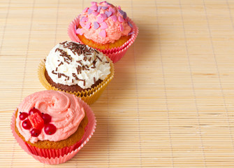 festive cupcakes with different creams