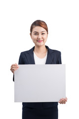 Young attractive asian woman showing a white board