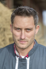 Fototapeta premium Portrait of young attractive farmer