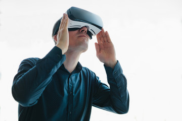 The man with glasses of virtual reality. Future technology concept.