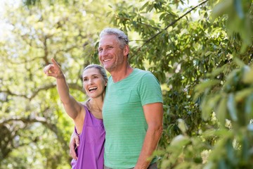 Couple smiling and pointing