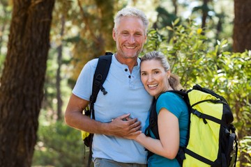 Couple smiling and holding each other