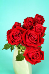 Beautiful red roses in vintage style on background