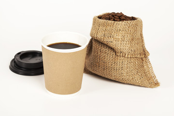 Paper cup of coffee on white background