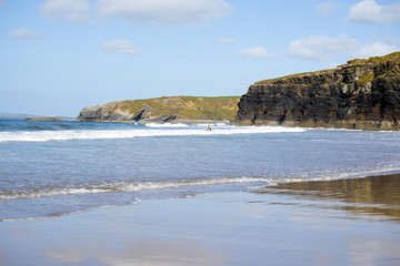 kayaker breaking waves at ballybunion