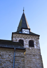 Fototapeta na wymiar Church tower with blue sky.
